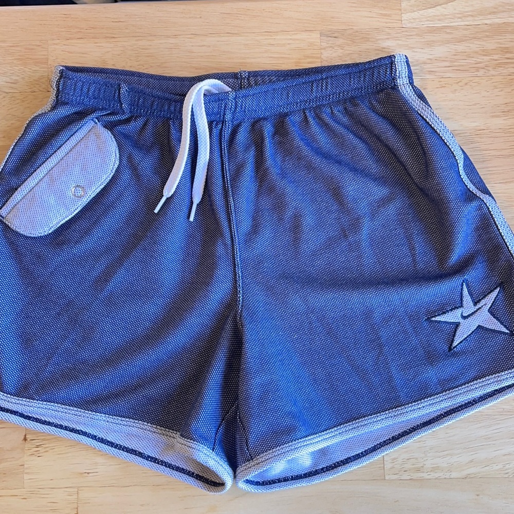 Nike dolphin hem shorts L
